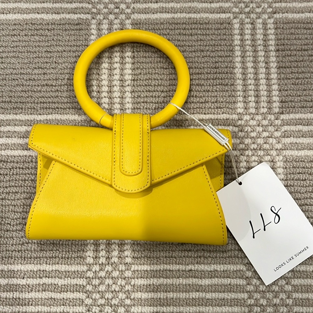 NWT Yellow mini handbag with strap included